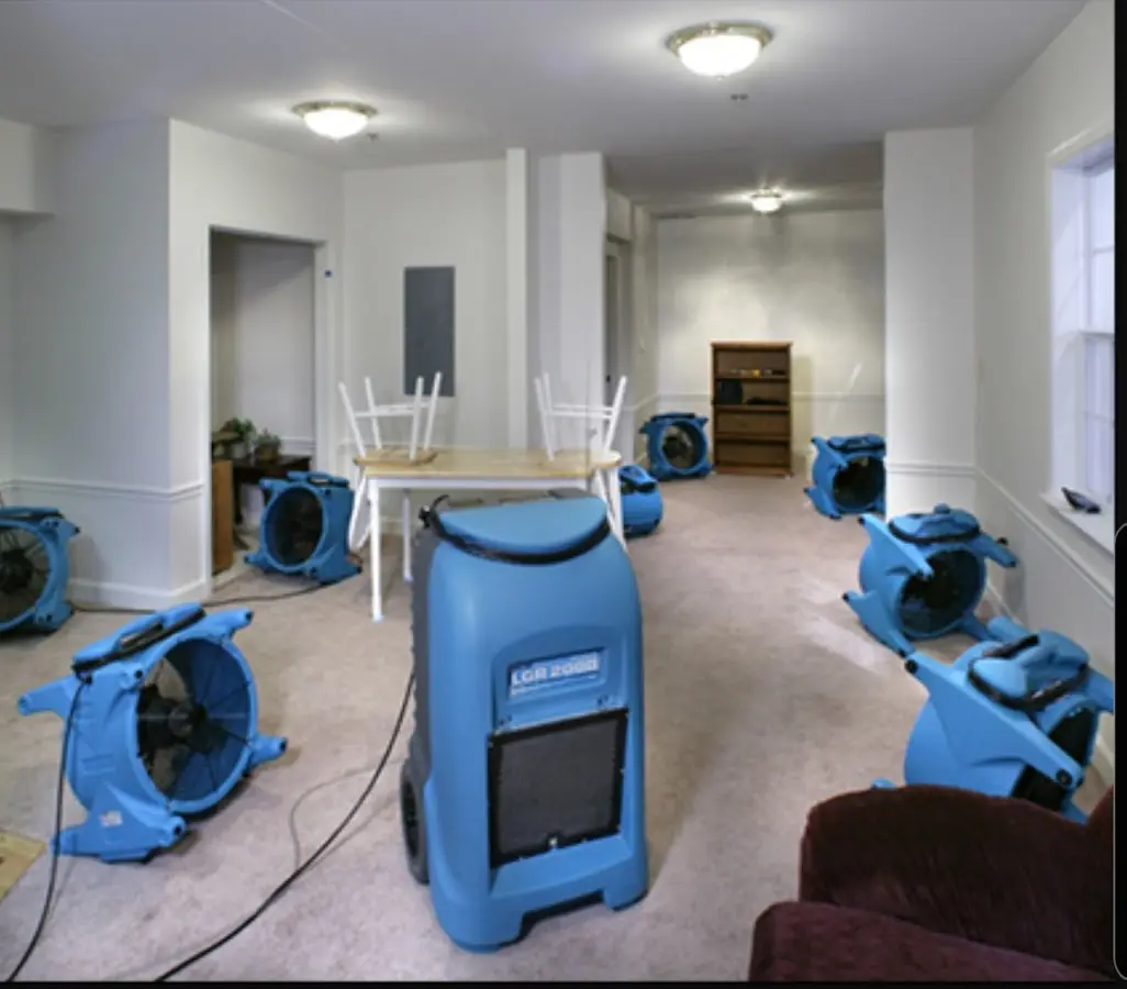 Air movers and dehumidifier setup for Water Damage Restoration in Oakdale
